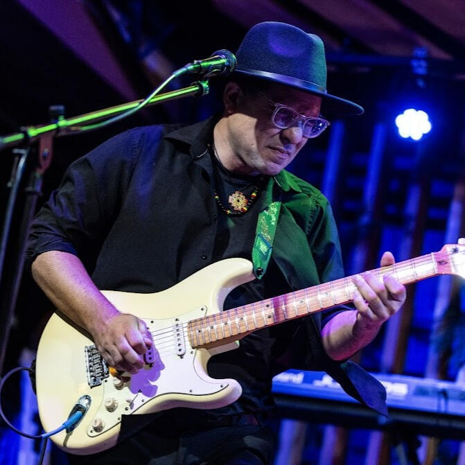 Live performance at Sugarshack by Kevin Bires Everton Vidal Azevedo playing electric guitar at Sugarshack Downtown, live concert, photo by Kevin Bires.