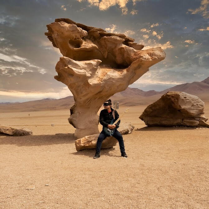 Stone Tree, Bolivia Everton Vidal Azevedo with his palazzolo guitar at the Stone Tree Rock formation in Bolivia. Photo by Marvin Montes
